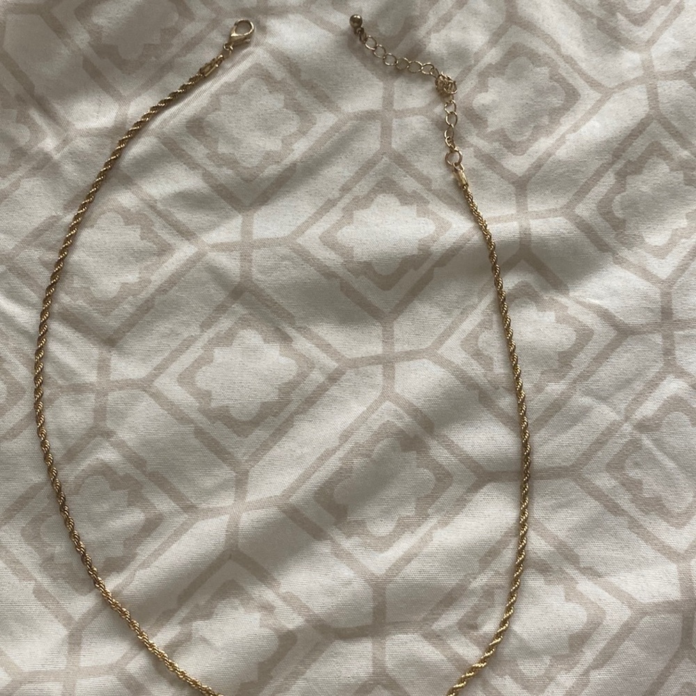 Necklace, gold, do not shower, or add any substance with or on it!